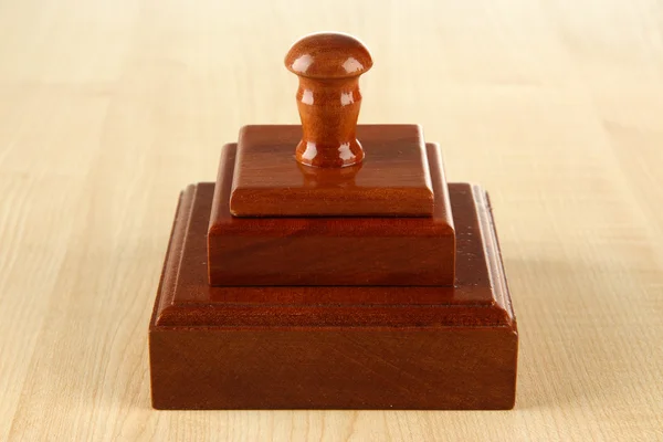 Stempel drewniany na drewniane tła — Zdjęcie stockowe