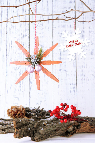 Christmas composition with snowflakes on wooden background