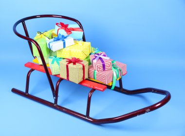 kızak ile Noel, üzerinde mavi arka plan sunar