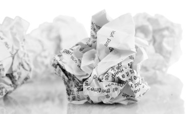 Crumpled paper balls isolated on white clipart