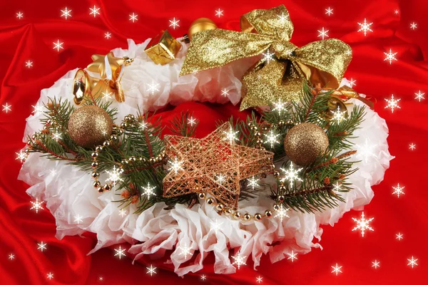 Christmas wreath on fabric background — Stock Photo, Image