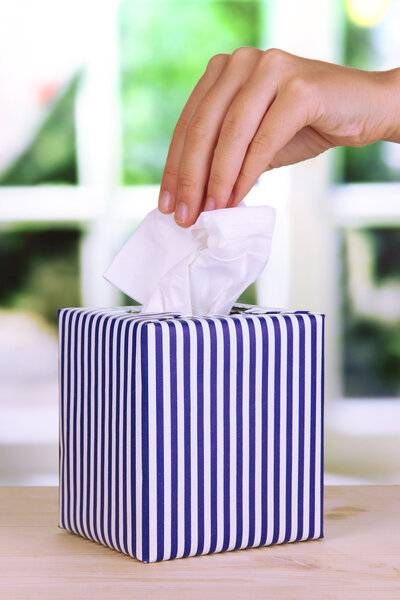 Cleaning wipes on window background