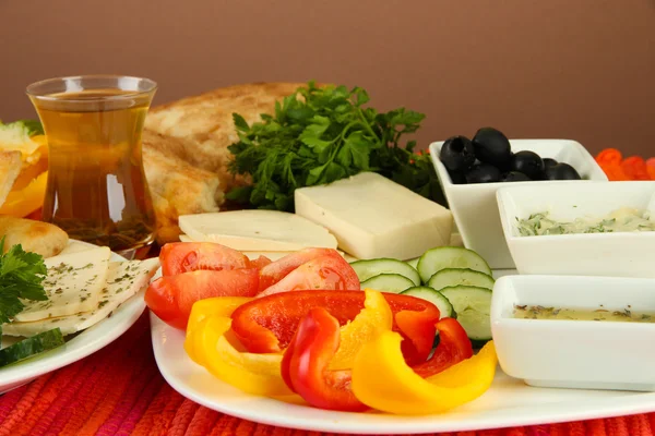 Traditional Turkish breakfast on table on brown background — Stock Photo, Image