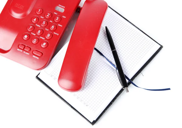 Telephone and notepad and other items, isolated on white — Stock Photo, Image