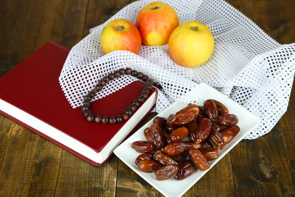 Composition with traditional Ramadan food, on wooden background — Stock Photo, Image