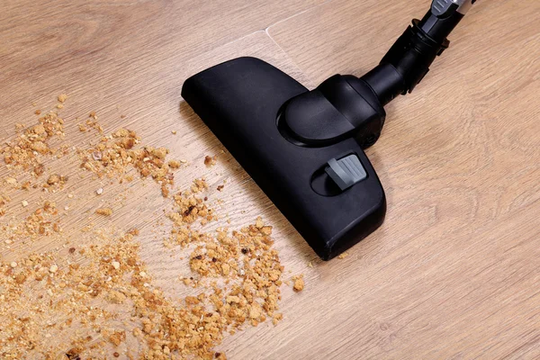 Vacuuming floor in house — Stock Photo, Image