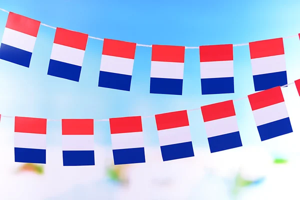 Garland of flags on bright background — Stock Photo, Image