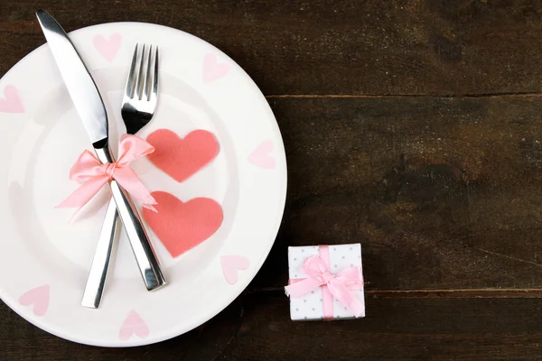 Romantic holiday table setting, on wooden background — Stock Photo, Image