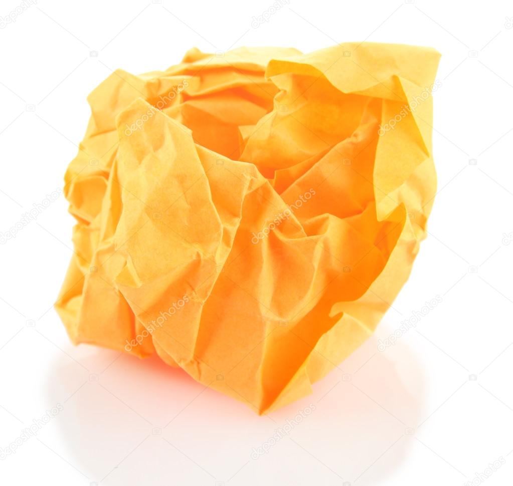 Orange crumpled paper ball isolated on white