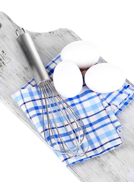 Corola y huevos sobre tabla de madera aislados sobre blanco —  Fotos de Stock