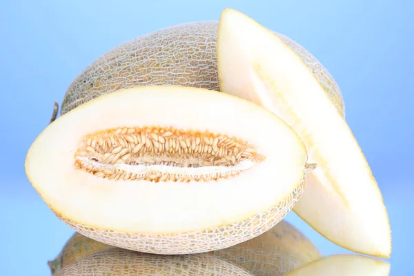 Melones maduros sobre fondo azul —  Fotos de Stock