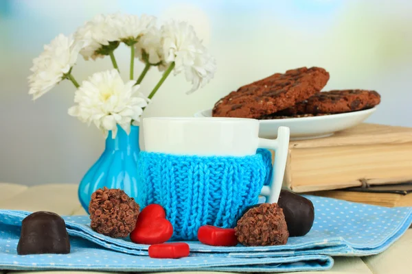 Cup with knitted thing on it close up — Stock Photo, Image