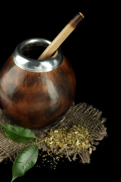 Calabash and bombilla with yerba mate isolated on black — Stock Photo, Image