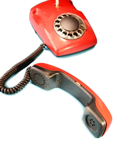 Renkli arka plan üzerinde kırmızı retro telefon — Stok fotoğraf