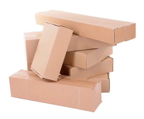 Différentes boîtes en carton isolées sur blanc — Photo
