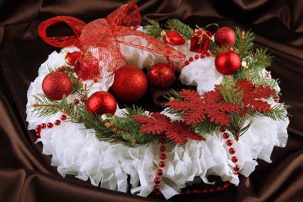 Christmas wreath on fabric background — Stock Photo, Image