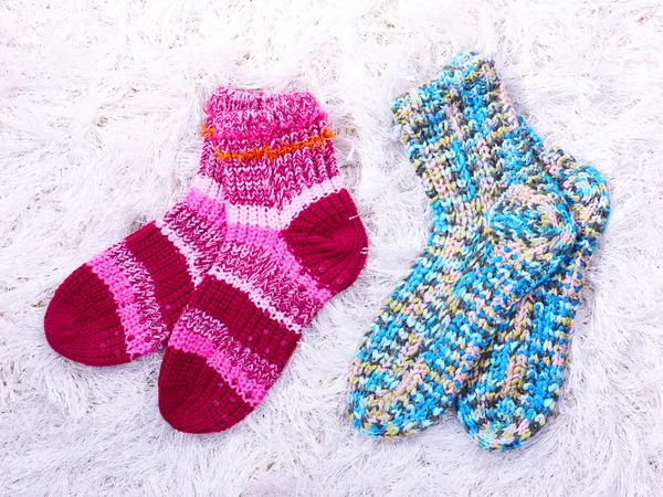 Woolen socks, on color background — Stock Photo, Image