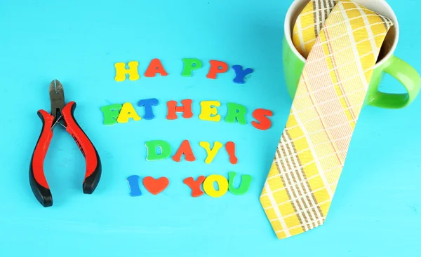 Happy Fathers Day (concept image with multicolor letters and tools, on wooden background) — Stock Photo, Image