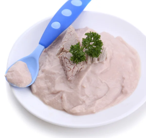 Pâte de viande pour l'alimentation des nourrissons, sur plaque, isolée sur blanc — Photo