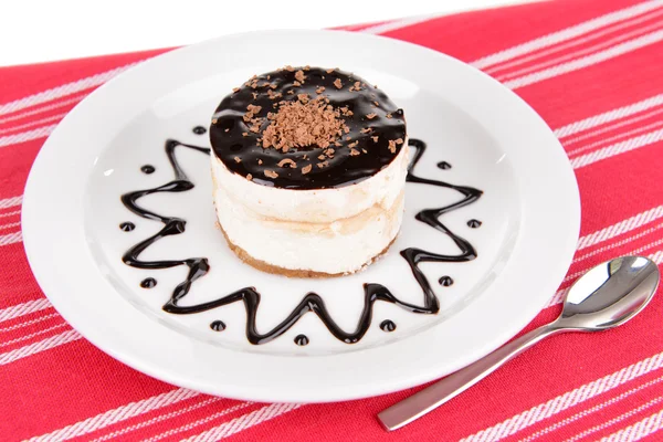 Sweet cake with chocolate on plate on table close-up — Stock Photo, Image