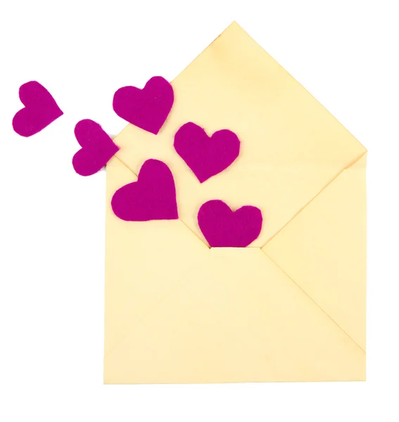 Envelope velho bonito com corações decorativos, isolado em branco — Fotografia de Stock