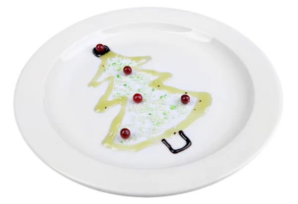 Árbol de Navidad de chocolate en plato aislado en blanco —  Fotos de Stock