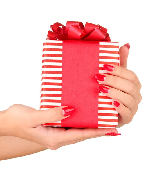 Woman holds box with gift on white background close-up — Stock Photo, Image