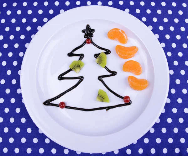 Christmas tree from chocolate on plate close-up — Stock Photo, Image