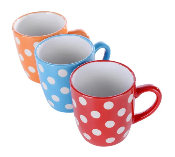 Color polka dot mugs isolated on white — Stock Photo, Image