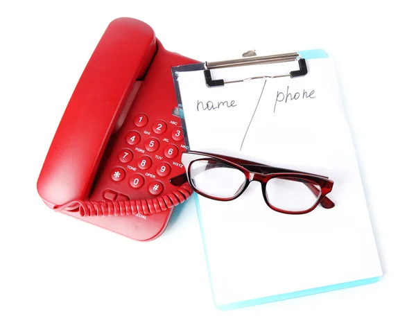 Telephone and notepad and other items, isolated on white — Stock Photo, Image