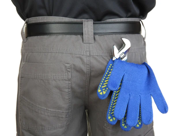 Gloves and instruments in back pocket close-up — Stock Photo, Image