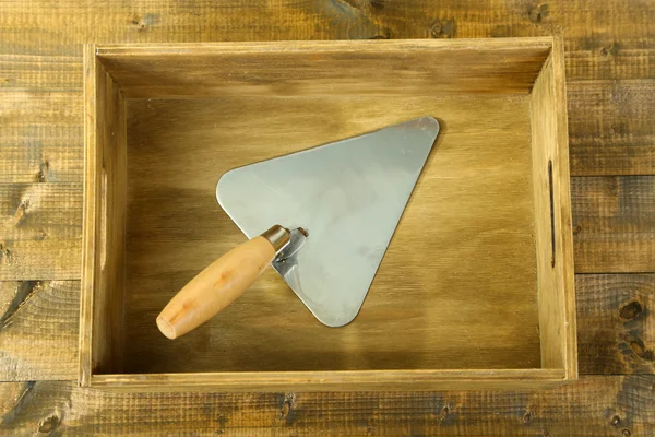 Instrumento en caja de madera, sobre fondo de color — Foto de Stock