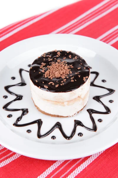 Sweet cake with chocolate on plate on table close-up — Stock Photo, Image