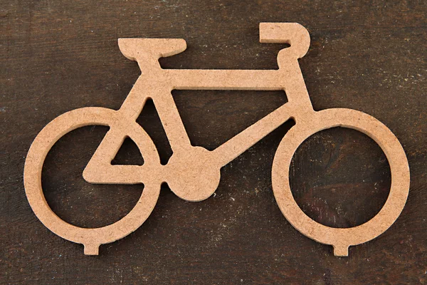 Vélo décoratif sur fond en bois — Photo