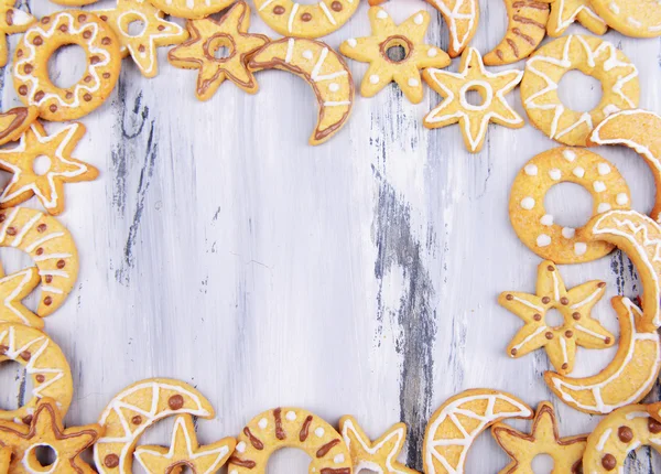 Delicious Christmas cookies on wooden background — Stock Photo, Image