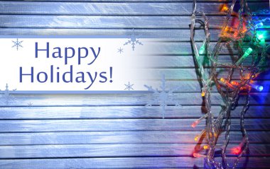 Ahşap arka planda Noel ışıkları