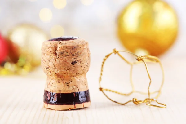 Champagne cork på jul ljus bakgrund — Stockfoto