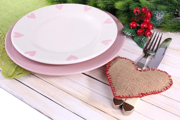 Set of utensil for romantic dinner, on table, on light background — Stock Photo, Image