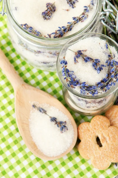 Jar of lavender sugar and fresh lavender flowers on wooden background — Stock Photo, Image