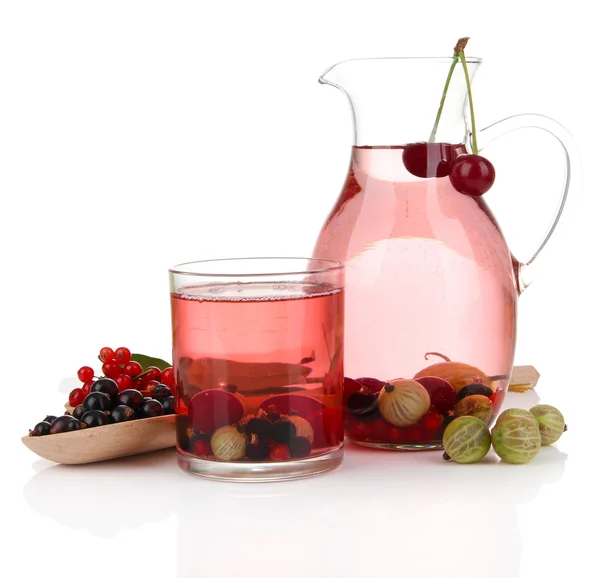 Pitcher and glass of compote with summer berries isolated on white — Stock Photo, Image