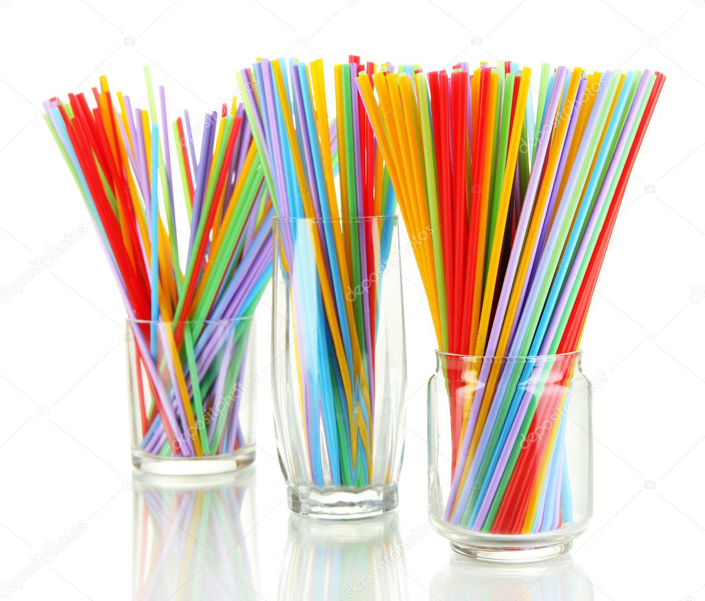 Many straws in glasses isolated on white