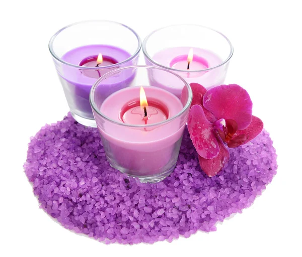 Beautiful colorful candles, orchid flower, sea salt isolated on white — Stock Photo, Image