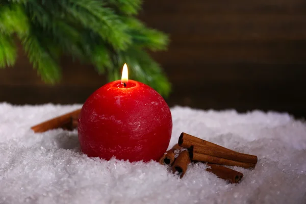 Burning candle on wooden background — Stock Photo, Image