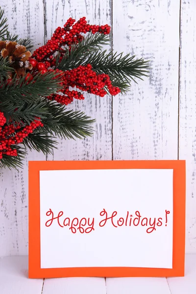 Christmas card on wooden background — Stock Photo, Image