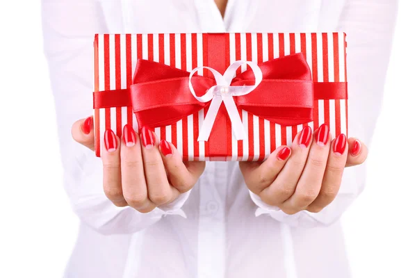 Woman holds box with gift on white background close-up — Φωτογραφία Αρχείου