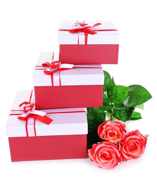 Beautiful gift boxes with flowers isolated on white — Stock Photo, Image