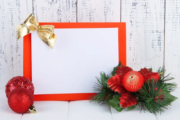 Christmas card on wooden background — Stock Photo, Image