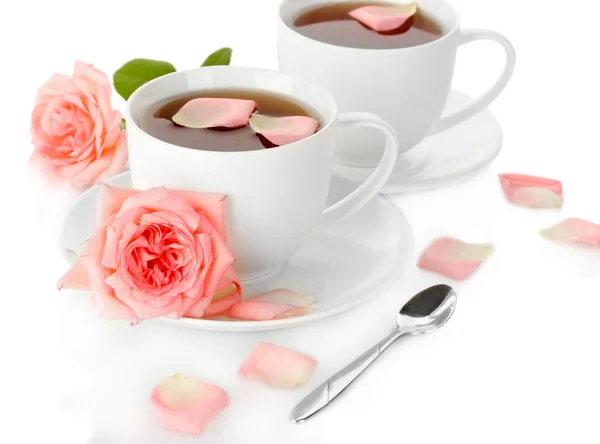 Cups of tea with roses isolated on white — Stock Photo, Image