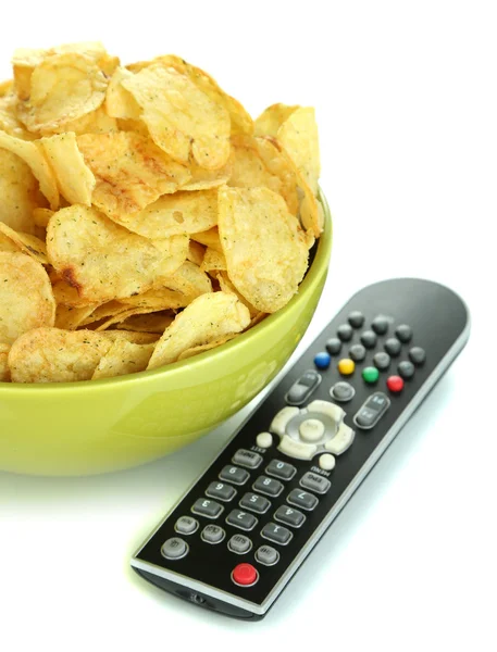 Chips in bowl and TV remote isolated on white — Stock Photo, Image
