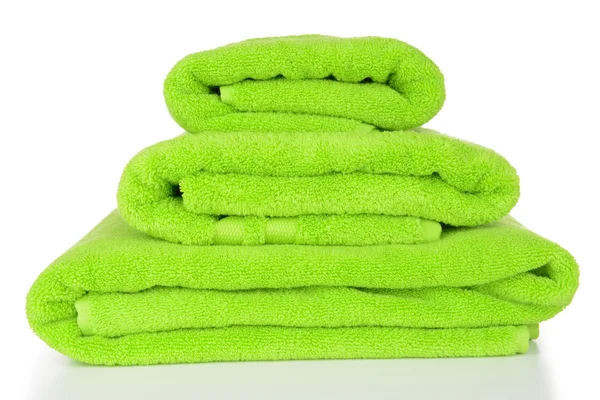 Green towels isolated on white — Stock Photo, Image